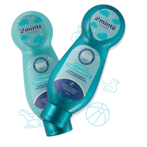 Shampoo y tratamiento Mintë Kids crecimiento frascos turquesa con iconos infantiles